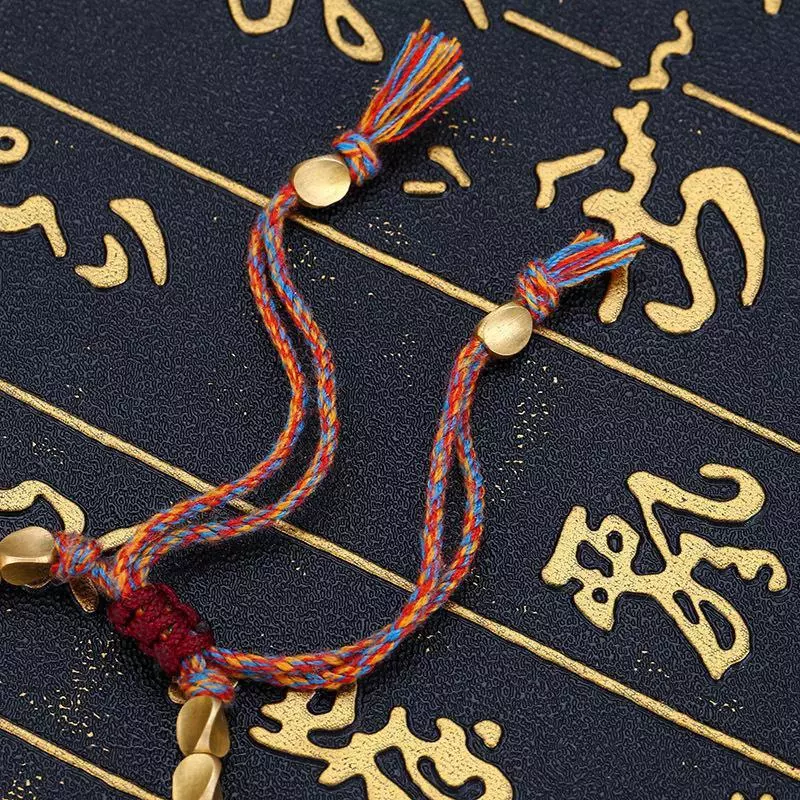The braided cord of the bracelet, close up